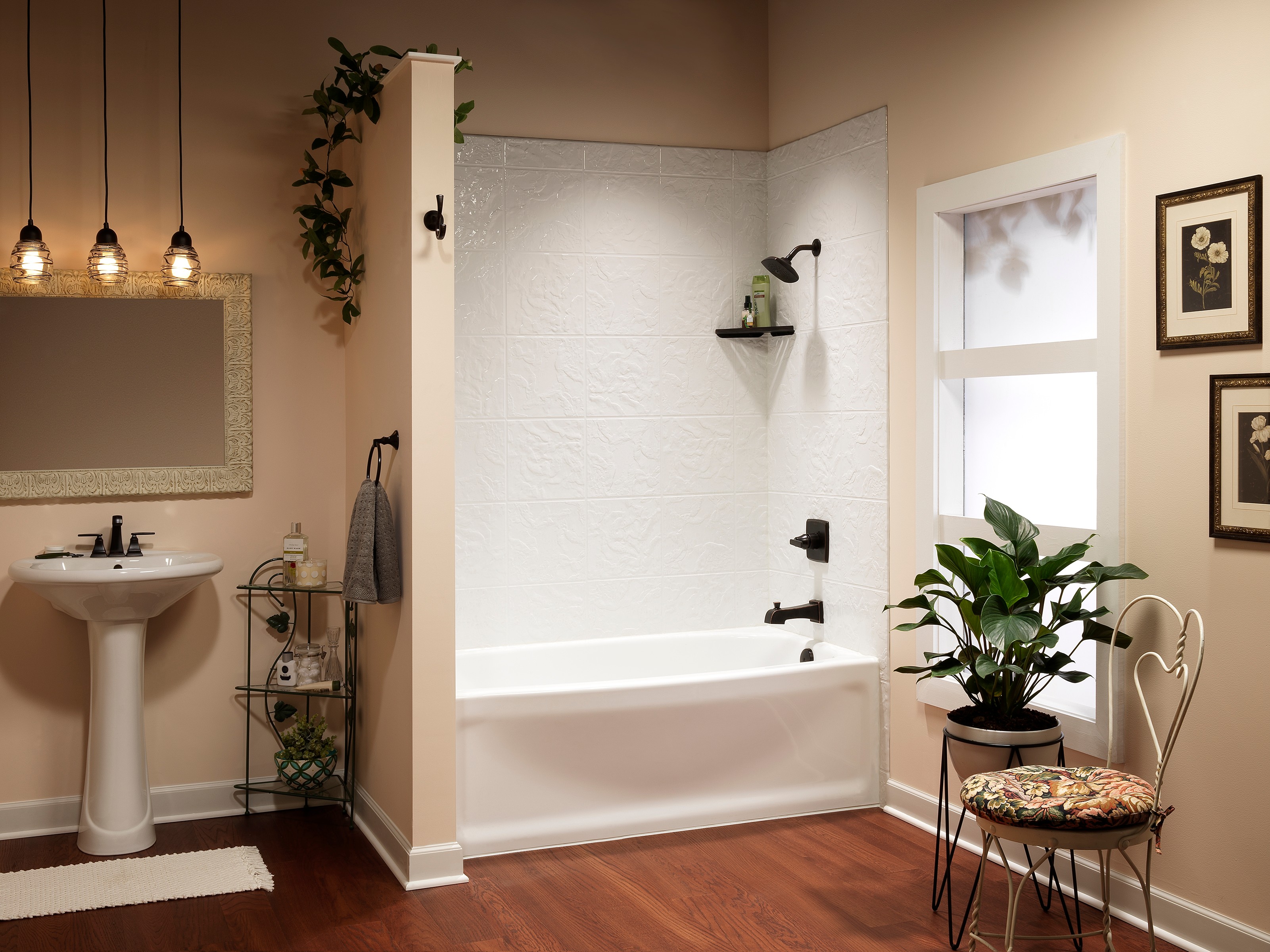 Pedestal sink with tub-shower combo and warm painted walls