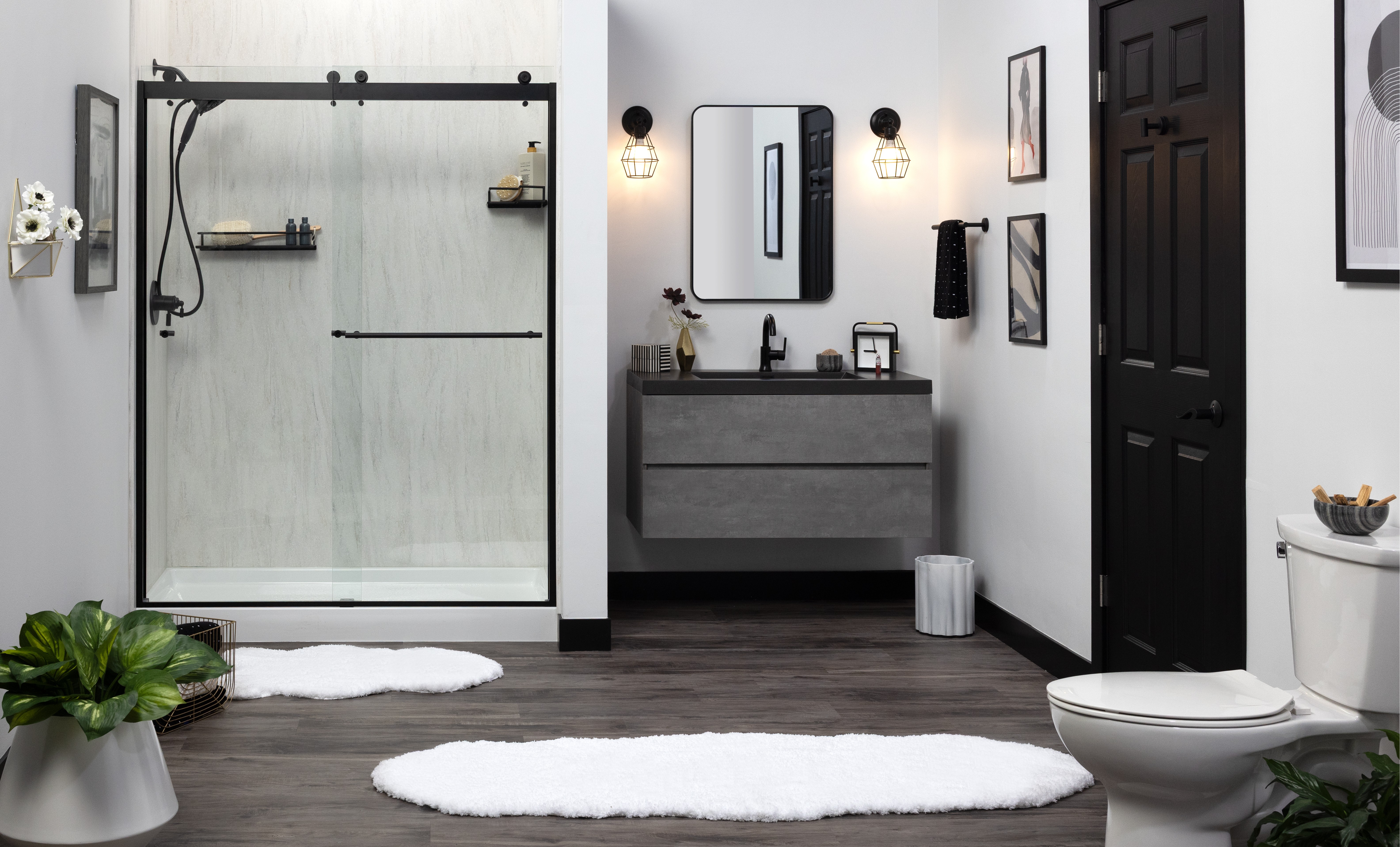 Dark wood vanity with marble shower and floating design — luxury remodel