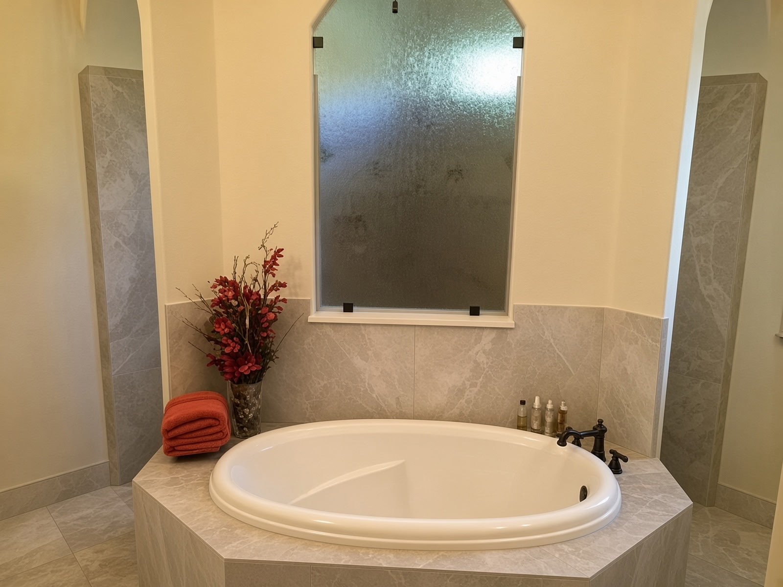 Custom Built-In Stone Deck Oval Soaking Tub with Frosted Privacy Window